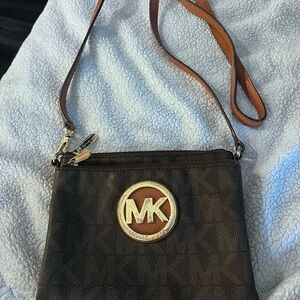 Michael Kors Brown Crossbody Bag with Gold Logo and Durable Canvas